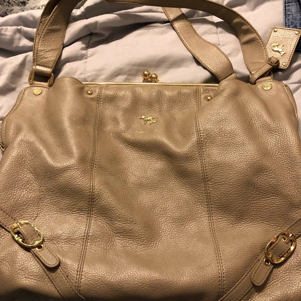 Emma Fox tan purse.  Lots of details!